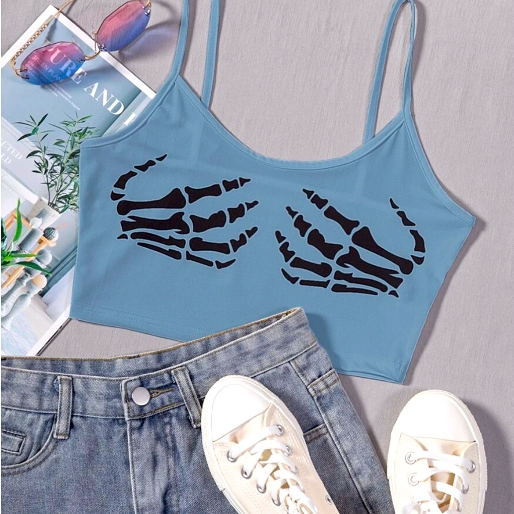 Blue cropped tank tap with skeleton hands